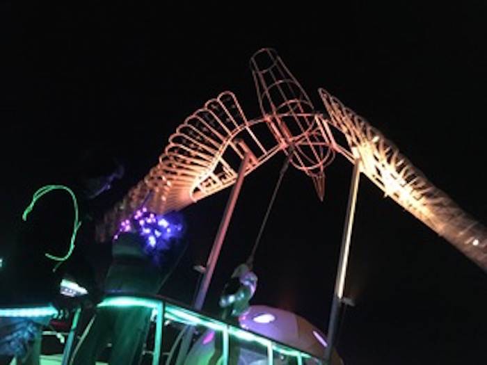 Flying desert eagle burning man